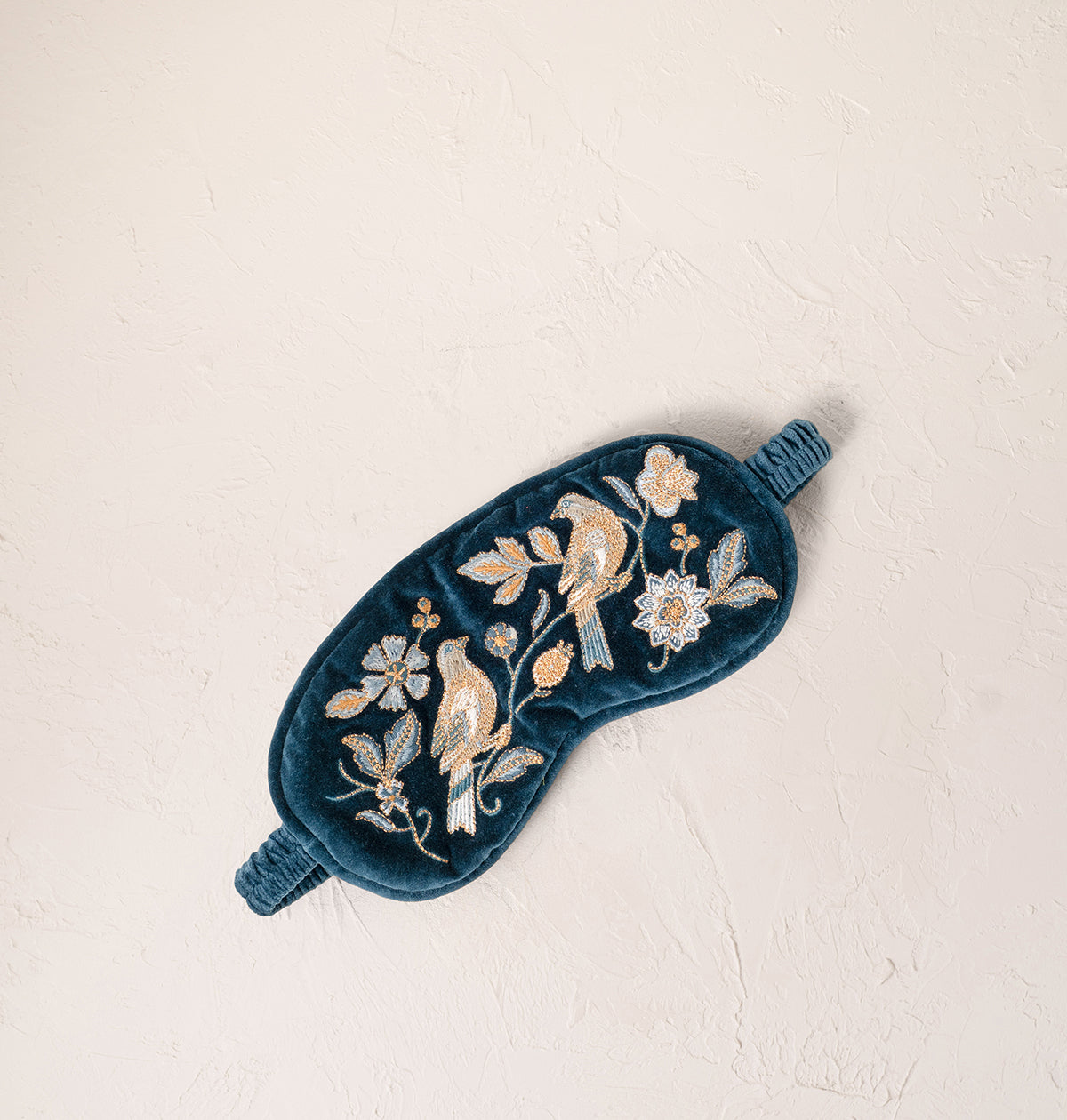 Botanical Birds eye mask in ink blue, embroidered with birds among climbing vines