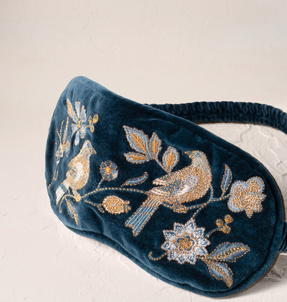 Botanical Birds eye mask in ink blue, close-up of the embroidered birds and vines