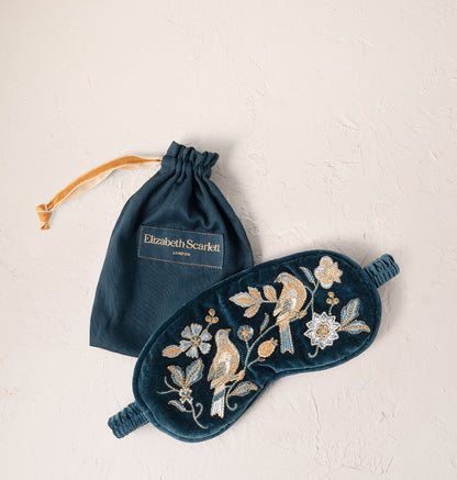 Botanical Birds eye mask in ink blue with its elastic strap